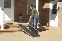 Woman folding the Suitcase Trifold AS Ramp