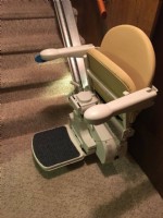 Stairlift at Bottom of Basement Stairs with seat folded up Lifeway Indiana