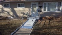 aluminum modular wheelchair ramp for wheelchair access to suburban home in Chicago