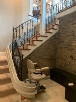 custom curved stairlift at bottom landing in Indianapolis home