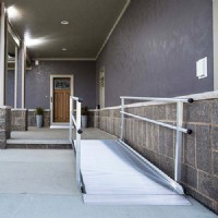 Solid Surface Portable Ramp With Handrails, Installed