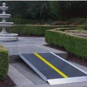 portable ramp providing access to a waterfall in home garden