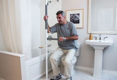 Man-Using-Superbar-to-get-off-toilet